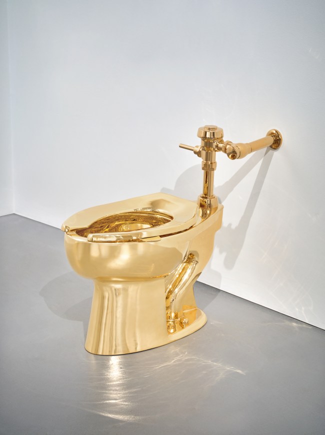 Gold toilet by Italian artist fetches over $12 million at auction