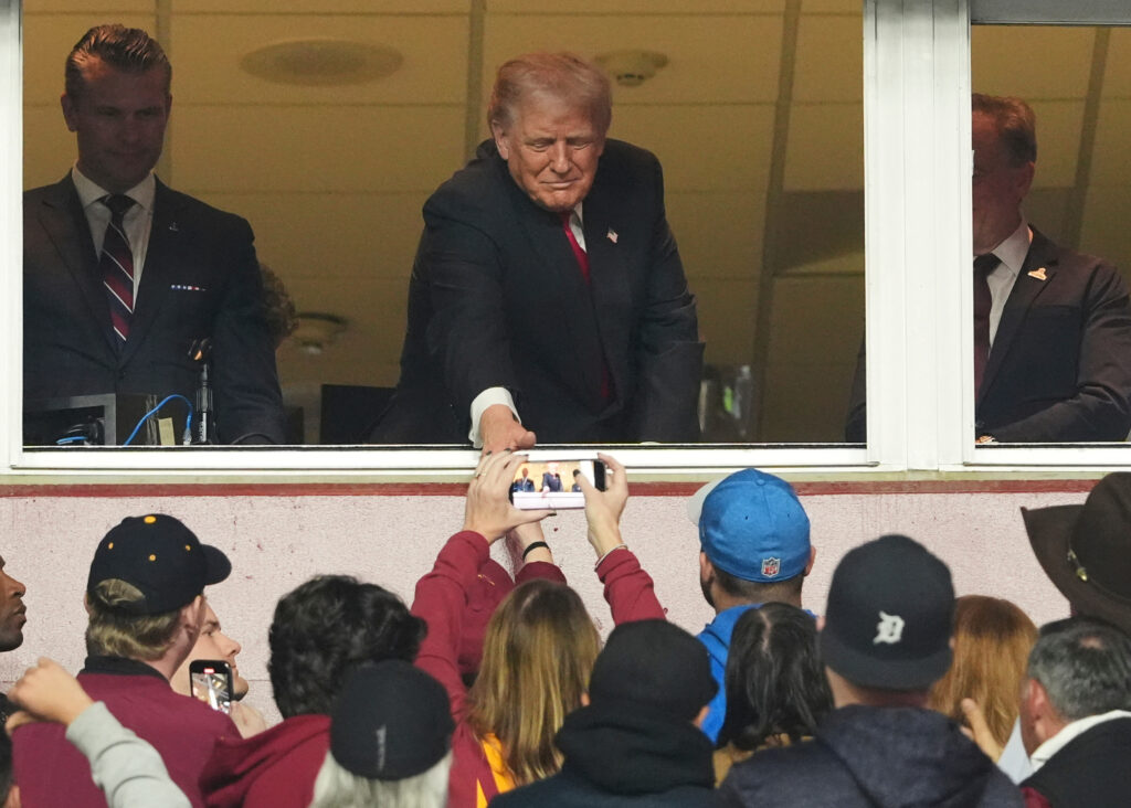 Trump receives mixed reception at Commanders game amid stadium naming talks
